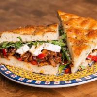 Caponata And Feta Sandwich · House made Caponata, eggplant and vegetable sweet sour relish with goat and sheeps milk feta...