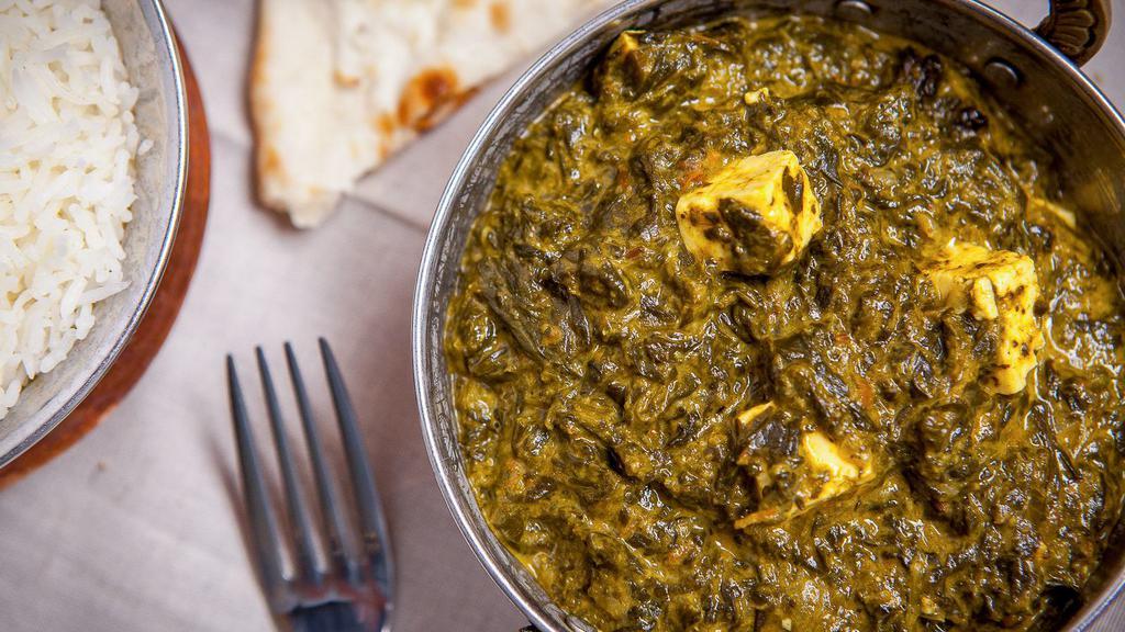 Saag Paneer · paneer(cheese) cooked in a fresh spinach curry sauce.