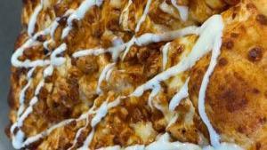 Buffalo Chicken Pizza (Medium) · Buffalo chicken, red onion, feta cheese, served with drizzle ranch.
