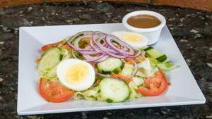 House Salad · Romaine lettuce, tomato, red onion, feta cheese, mozza / pro. Each salad comes with two brea...