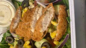 Crispy Chicken Salad · Crispy chicken, romaine lettuce, tomato, red onion, cucumber, avocado, black olives, corn.