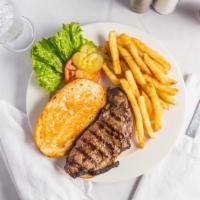 New York Strip Steak & Eggs · A 10 oz. black Angus strip steak grilled to your liking and paired with two eggs.