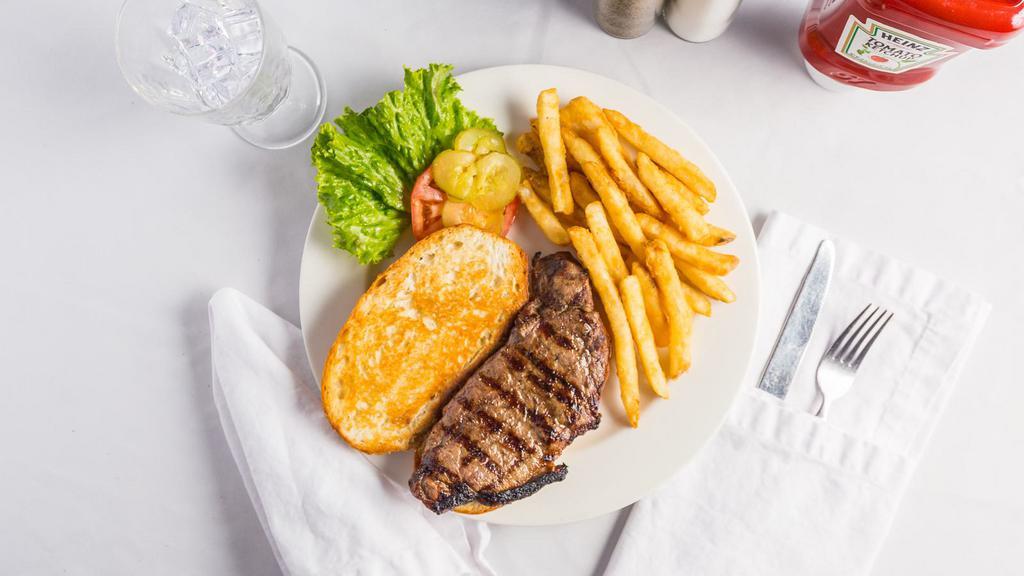 New York Strip Steak & Eggs · A 10 oz. black Angus strip steak grilled to your liking and paired with two eggs.