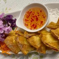 Crab Rangoon (6Pcs) · Deep-fried wonton skin wrapped with cream cheese and imitation crab meat served with sweet c...