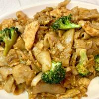 Pad See Ewe · Stir-fried fresh wide rice noodles, egg, broccoli, carrots, black sweet soy sauce, and Thai ...