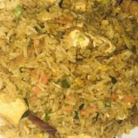 Curry Fried Rice · Stir-fried rice with your choice of protein, egg, white onions, carrots, celery, pea pods, a...
