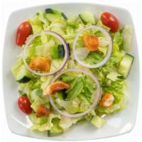 Side Garden Salad · Romaine or iceberg mix, tomatoes, red onions, cucumbers, croutons and our creamy house vinai...