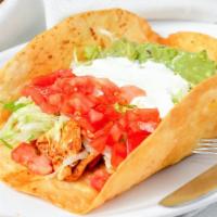 #49. Taco Loco Salad · A crispy fried flour shell with grilled chicken or steak, lettuce, cheese, tomatoes, sour cr...