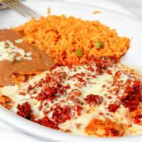 #79. Choripollo · Chicken breast topped with chorizo. Served with rice, beans and tortillas.