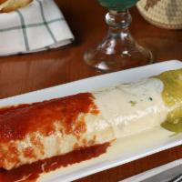 Burrito Bandera  · A massive flour tortilla burrito stuffed with your choice of grilled chicken, steak, carnita...