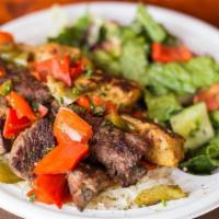 Meat Assortment Plate · Served with chicken kabob, beef kabob, kafta, choice of rice, house salad, grilled onions an...