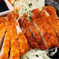 Tonkatsu · Served with oriental tangy sauce and a side rice.