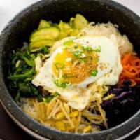 Bi Bim Bap (Cool) · Served with side rice. Seasoned beef and vegetables over rice served with a side of spicy sa...