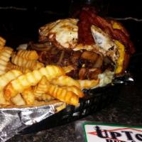 Stuffed Burger W/Fries · Stuffred with your choice of cheese. This gooey burger comes out with a molten center of che...