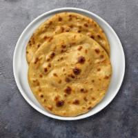 Random Acts Of Roti  · Whole wheat Indian bread cooked in a clay oven.