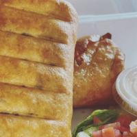 Chimichangas · No Two chimichangas, your choice of meat & mozzarella cheese wrapped in a flour tortilla and...