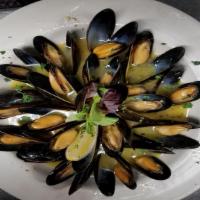Mussels · Gluten free. Prince Edward Island mussels steamed with butter, white wine and garlic.