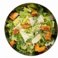 Caesar Salad · Hearts of romaine, shaved Parmesan cheese and croutons, tossed with classic Caesar dressing....