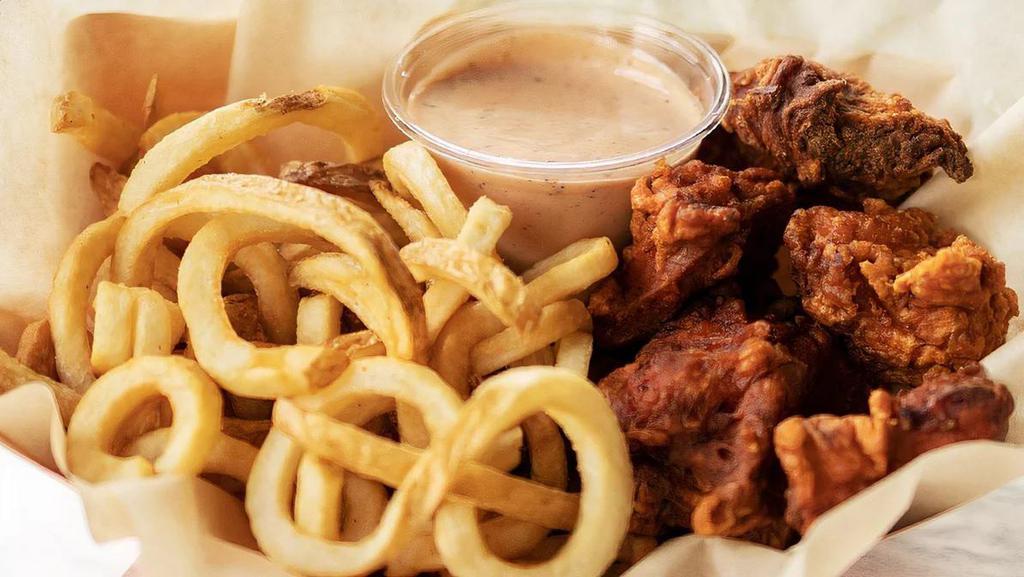 8 Piece Nuggies & Curly Fries · 100% made-from-scratch. Pickle-brined nuggets served with our savory curly fries and 2 sauces. All sauces are made-from-scratch house recipes.