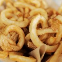 Curly Fries · Crispy curly-cut fries tossed in savory seasoning served with your choice of sauce. All sauc...