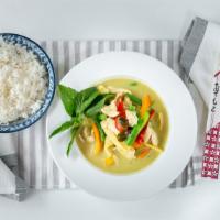 Green Curry · Hot & spicy. Green curry pastes in coconut milk with eggplants, bamboo shoots, bell peppers,...