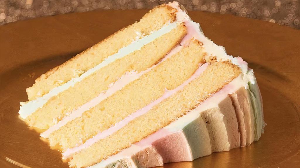 Rainbow Cake Slice - Goddess And Grocer · All profits from the sale of this cake in June will be donated to Howard Brown Health