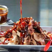 Smoked Pulled Pork · Smoked Pulled Pork Shoulder, Side of Original BBQ Sauce. *Gluten Free. Sauce served on the s...