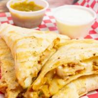 Quesadilla · Grilled onions, peppers and cheese on a 12' flour tortilla.