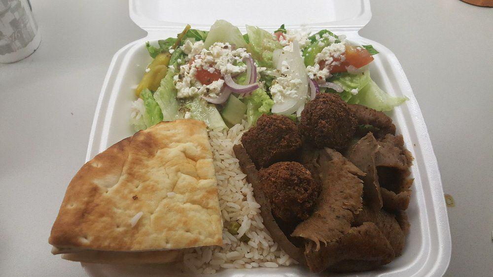 Sweis Feast · Greek salad, bowl of rice, 1lb gyros, 4 pita bread, Falafels.