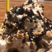 S' Mores · Graham cracker ice cream with classic hot fudge topped with marshmallow whipped cream, S'mor...