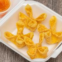 Crab Rangoon (4 Pieces) · Delicious crab and cream cheese wrapped in a crispy, fried wonton skin.