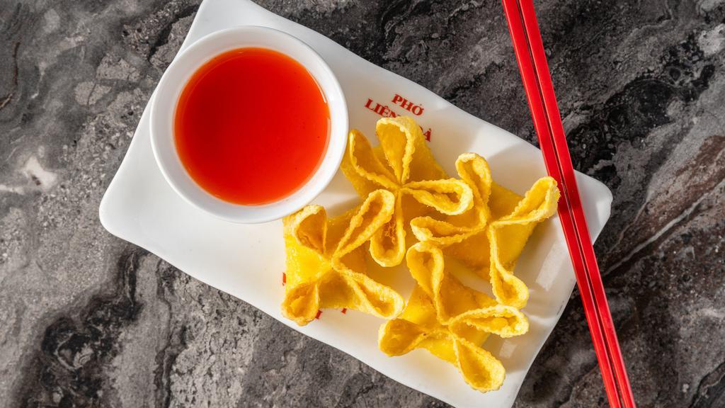 A7 Crab Rangoon (4) · Fried wontons stuffed with crab meat & seasoned cream cheese, served with special house sauce.