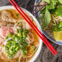 P16 Pho Tai · Rare steak in noodle beef soup.