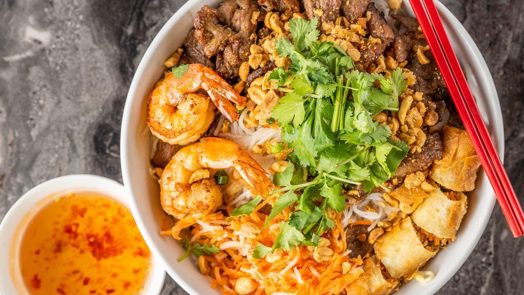 B8 Bun Tom Thit Nuong Cha Gio · Vermicelli noodles with grilled shrimp, sliced grilled marinated pork & crispy egg rolls.