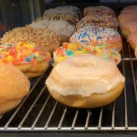 Half-Dozen Donuts · Preselected a dozen donut . 
This may include glaze, choco, cake, etc.