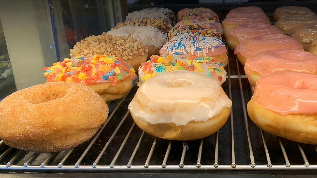 Half-Dozen Donuts · Preselected a dozen donut . 
This may include glaze, choco, cake, etc.