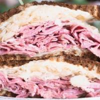 Classic Reuben · O'Toole's of Libertyville favorites. Corned beef, swiss, 1000 Island, sauerkraut, grilled ma...