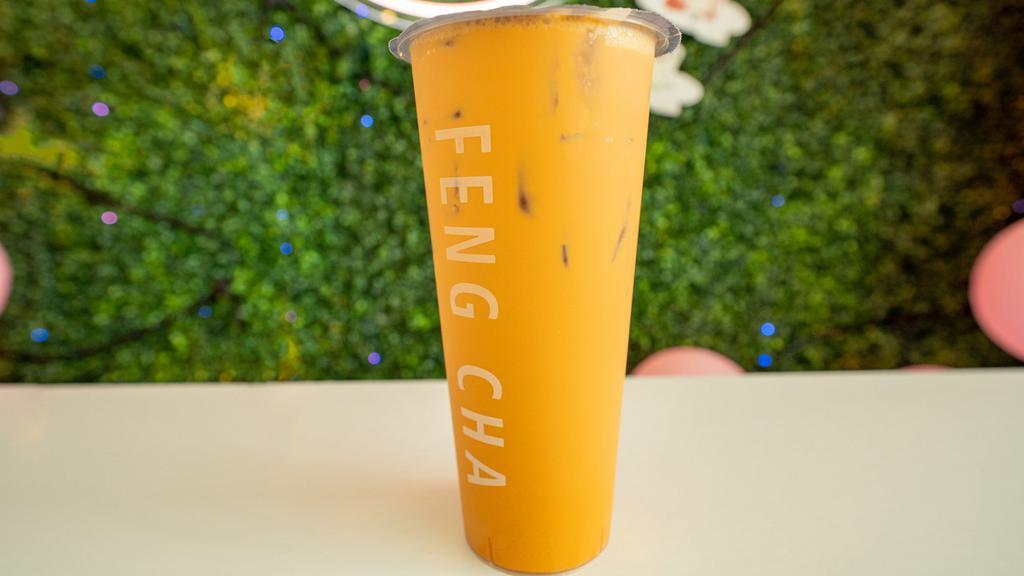 Thai Milk Tea (Iced) · Strong brewed thai tea complimented by the creaminess of our house made milk mix for a rich tasty beverage. The sweetness from the cream is perfect for the tea, and is recommended to be kept at normal ice level for the best taste!