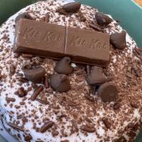 Taro Chocolate · Signature taro foam topped with chopped dark chocolate and Kit Kat bars for a delicious mix ...