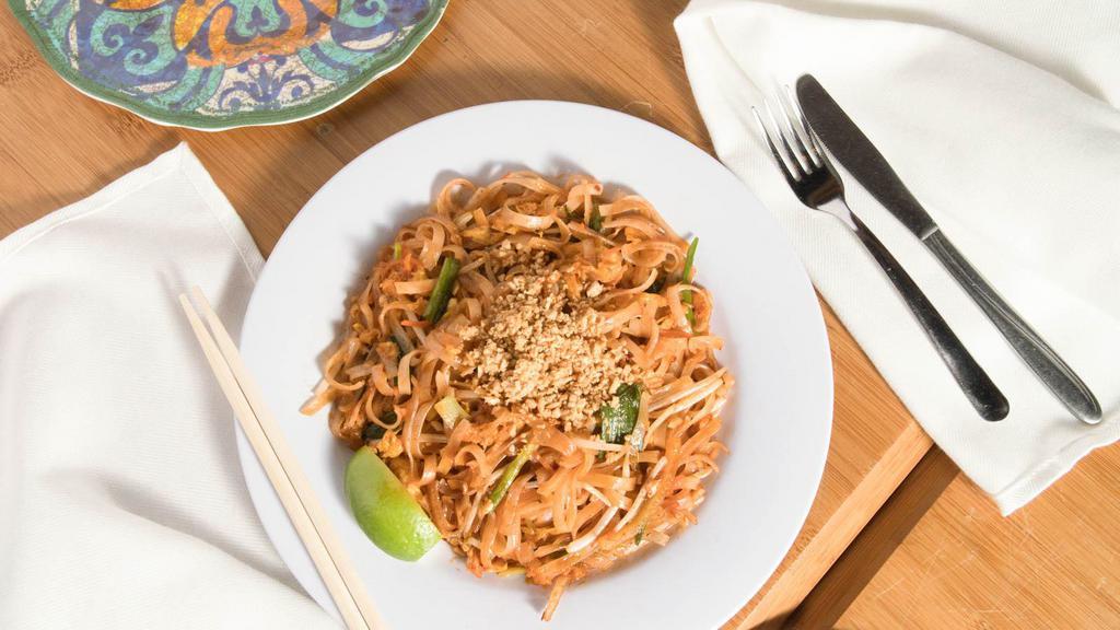 Chicken Or Fried Tofu Pad Thai Noodles · Spicy. Rice noodles stir-fried with carrot, bean sprouts, egg, onions and scallions then topped with crushed peanuts and slice of lime. (No rice.