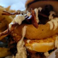 Wakey -Wakey  Burger · Over easy fried egg, beer battered onion ring, Wisconsin cheddar, bacon and dark ale mustard.