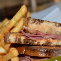 Reuben Sandwich · Corned Beef, sauerkraut, swiss cheese, thousand island on a marble rye bread
