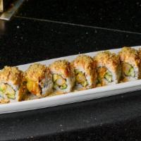 Lobster Crunchy Roll · Shrimp tempura, avocado and cucumber, topped with lobster salad and tempura flakes.