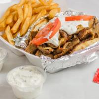 Gyro- Regular/Spicy · Onions, tomatoes, cucumber sauce, and feta cheese.