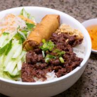 Bun Thit Nuong Cha Gio · Steamed vermicelli  with egg roll and grilled beef or pork.