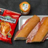 Il Milano Sandwich · Imported Genoa salami, mortadella, capicola with sharp provolone, lettuce, tomato, oil and v...