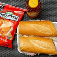 Amy'S Favorite Sandwich · Oven roasted turkey and imported ham with choice of cheese, lettuce, tomato and mayonnaise o...