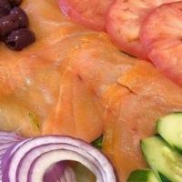 Lox Plate · EGGSPECIALLY GOOD LOX PLATTER. Delicate slice of Nova Scotia lox and. a fresh bagel plated w...