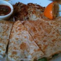 Ham & Jack Quesadilla · Scrambled eggs, ham, onions and green peppers grilled on a flour tortilla with Jack and ched...