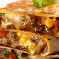 Eggspresso Quesadilla · Your choice of meat: chicken, steak or chorizo.. Served with sour cream, salsa and your choi...